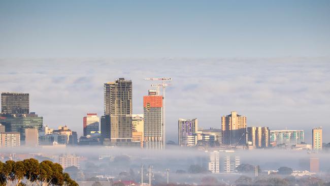 Thick fog over the city photographed from Skye Pictures/Russell Millard