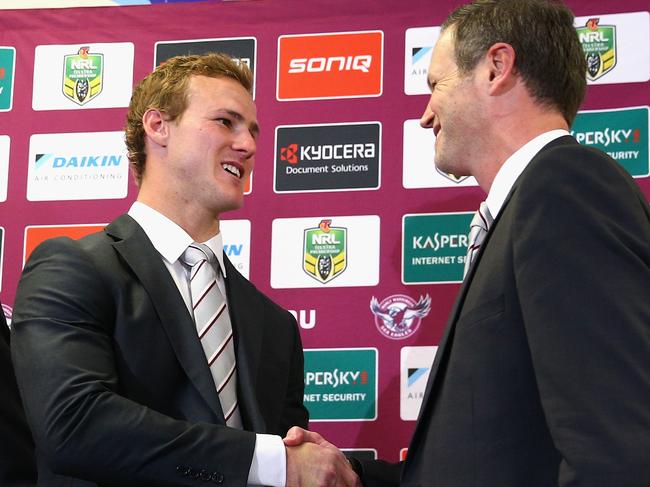 SYDNEY, AUSTRALIA - JUNE 03: Daly Cherry-Evans of the Sea Eagles shakes hands with chariman Scott Penn during a Manly Sea Eagles NRL press conference at Sydney Academy of Sport on June 3, 2015 in Sydney, Australia. Cherry-Evans has signed a life-time NRL deal with the Manly Sea Eagles after reneging on a contract with the Gold Coast Titans. (Photo by Cameron Spencer/Getty Images)