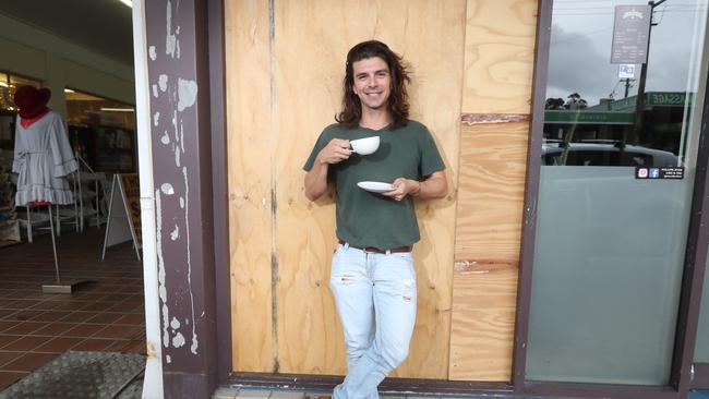 Brodie Green in 2018 when he took out a lease for a cafe in a spot that used to be an ATM. It was the Coast's smallest cafe. Photo by Richard Gosling