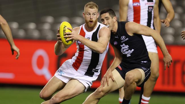 St Kilda’s Jonathon Marsh gets the better of Carlton’s Jacob Weitering at Marvel Stadium on Thursday night. Picture: Michael Klein