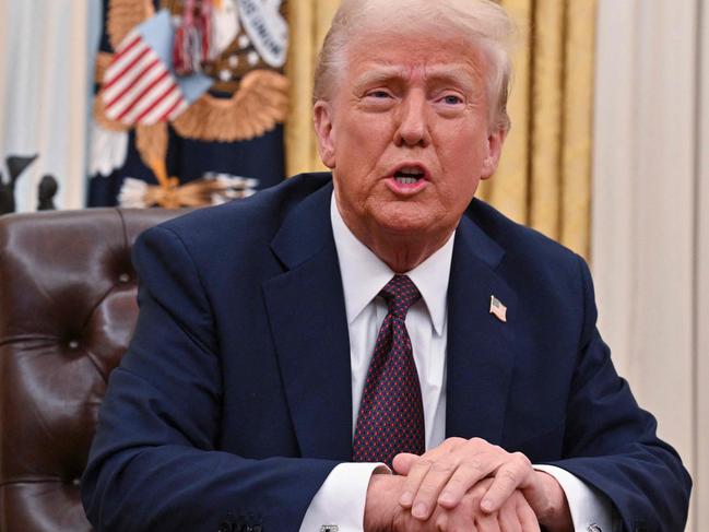 US President Donald Trump speaks to the media after signing Executive Orders in the Oval Office of the White House in Washington, DC, on January 23, 2025. (Photo by ROBERTO SCHMIDT / AFP)