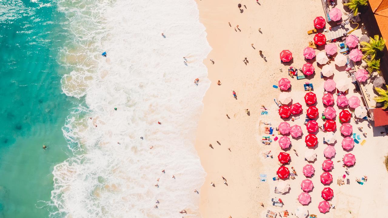 Be prepared to fight for your piece of sand if you do travel to Bali during the dry — also known as high — season.