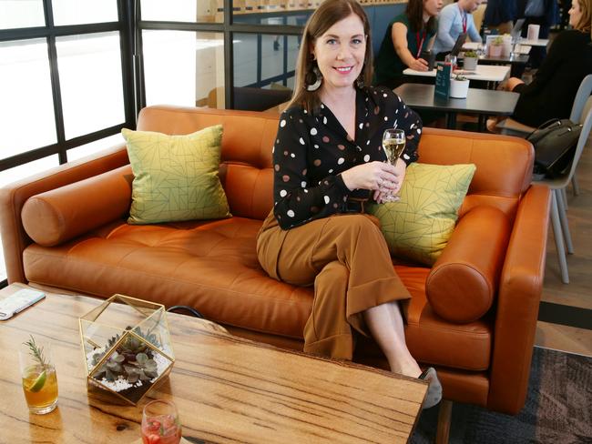 Courier Mail journalist Kylie Lang posing at the opening of My Lounge by Virgin Australia at Brisbane International Airport. Picture: Claudia Baxter