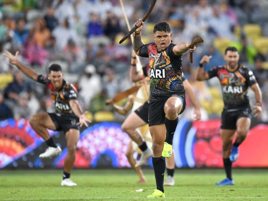 The Indigenous All Stars taking part in a pre-game ritual. (Digital image by Scott Davis, NRL Photos)