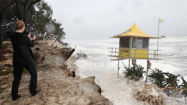 Gold Coast battered by Cyclone Alfred, as it made land. Tower 42 on The Spit becomes a tourist attraction.. Picture Glenn Hampson