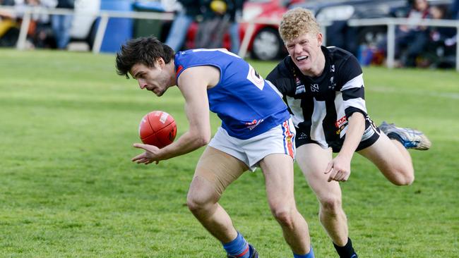 Matt Dean and Ben Salt compete for the footy during the Hills Football league division one grand final between Hahndorf and Onkaparinga Valley last year. Picture: AAP/Brenton Edwards