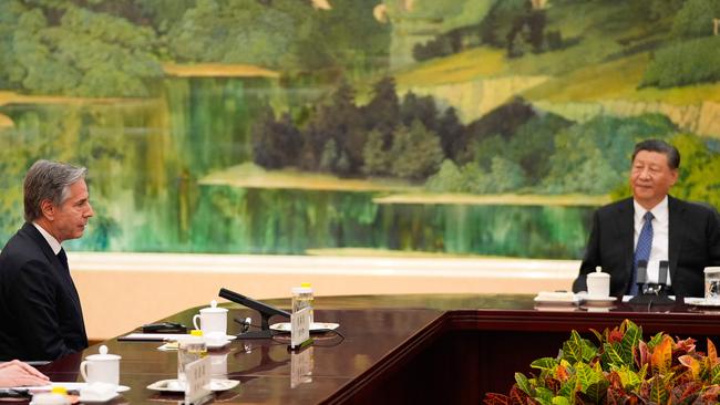 China's President Xi Jinping (R) speaks with US Secretary of State Antony Blinken during their meeting at the Great Hall of the People in Beijing. Picture: AFP.