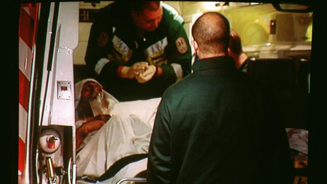 Franco Murat inside an ambulance after being set on fire. Picture: Channel 10