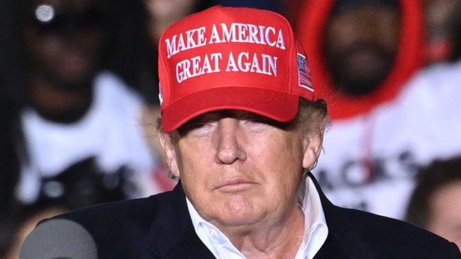 (FILES) In this file photo taken on January 15, 2022, former US President Donald Trump speaks during a rally at the Canyon Moon Ranch festival grounds in Florence, Arizona, southeast of Phoenix. - Merrick Garland, the US attorney general, was denied a lifetime seat on the Supreme Court by Republicans in the Senate. He now faces a decision arguably every bit as weighty as anything he may have faced on the nation's highest court: the potential prosecution of a former president of the US. The 69-year-old Garland personally approved the stunning August 8 FBI search of Donald Trump's Florida home and will have the final say on whether he is to be charged with any crimes. (Photo by Robyn Beck / AFP)