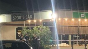 Police at the Sundowner Hotel Motel at Caboolture where a man died after an alleged 'one-punch' attack on Wednesday night.