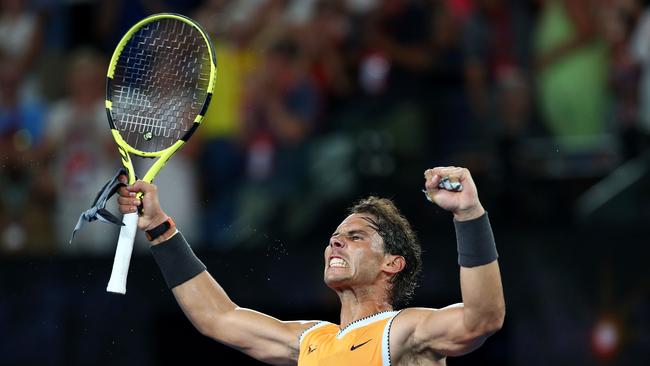 MELBOURNE, AUSTRALIA - JANUARY 24:  Rafael Nadal of Spain celebrates match point after winning his Men's Singles Semi Final match against Stefanos Tsitsipas of Greece during day 11 of the 2019 Australian Open at Melbourne Park on January 24, 2019 in Melbourne, Australia.  (Photo by Cameron Spencer/Getty Images)