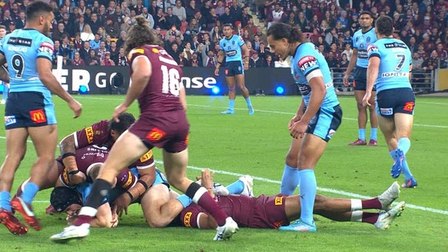 Jarome Laui stands over Selwyn Cobbo and sledges him while concussed on the ground.