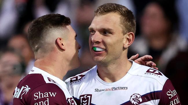 SYDNEY, AUSTRALIA - JULY 21: Tom Trbojevic of the Sea Eagles celebrates with team mate Reuben Garrick after scoring a try during the round 20 NRL match between Manly Sea Eagles and Gold Coast Titans at 4 Pines Park, on July 21, 2024, in Sydney, Australia. (Photo by Brendon Thorne/Getty Images)