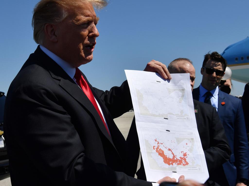 Donald Trump on Friday showed a map he said indicated the end of IS and its so-called ‘caliphate’. Picture: Nicholas Kamm / AFP