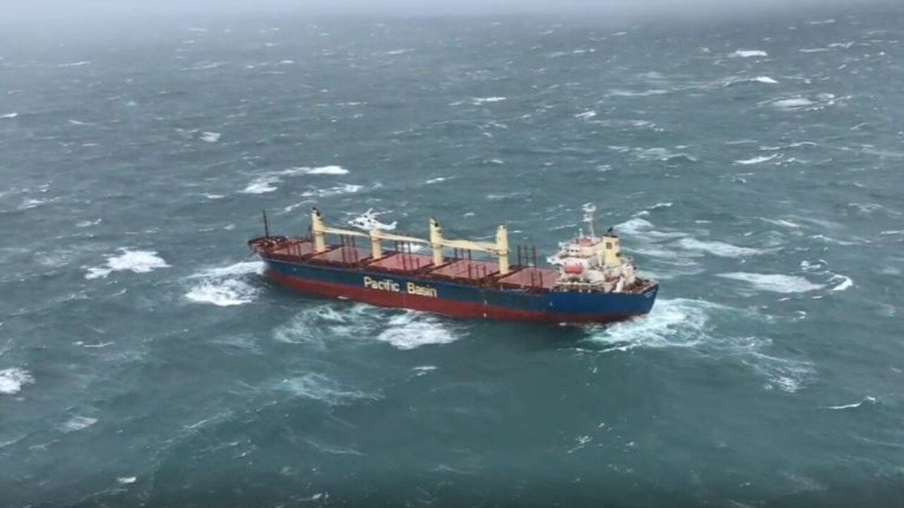 Rescuers battled to help the 150-metre Portland Bay cargo ship with 21 crew which lost power in heavy seas. Source: Surf Life Saving NSW