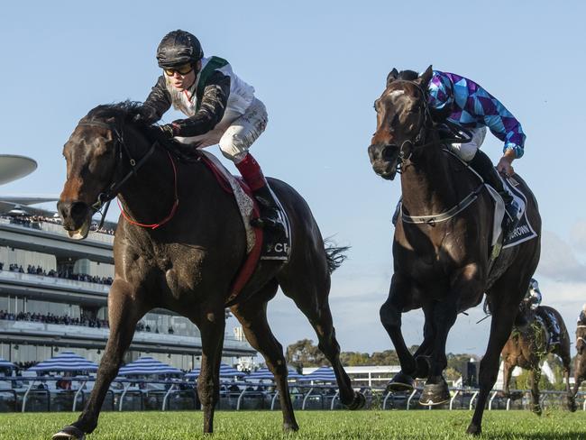 MELBOURNE, AUSTRALIA - SEPTEMBER 14: Craig Williams riding Mr Brightside defeats Declan Bates riding Pride of Jenni in Race 8, the Crown Makybe Diva Stakes - Betting Odds, during Melbourne Racing at Flemington Racecourse on September 14, 2024 in Melbourne, Australia. (Photo by Vince Caligiuri/Getty Images)