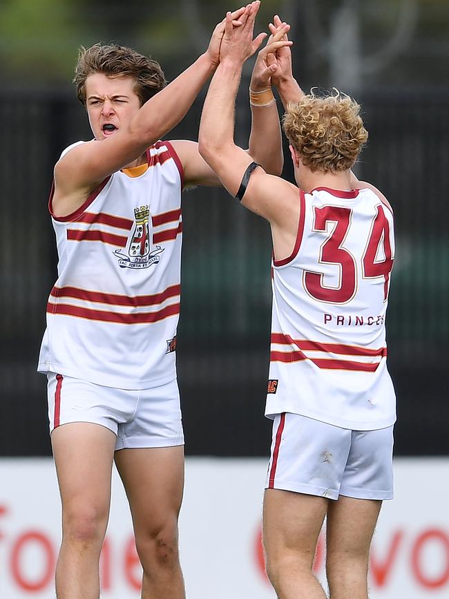 PAC’s Harry McInnes celebrates a goal with skipper Harry Tunkin. Picture: Mark Brake