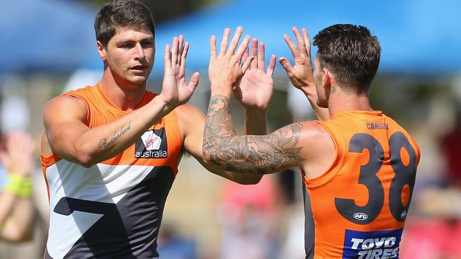 Jonathon Patton celebrates a goal with Daniel Lloyd.