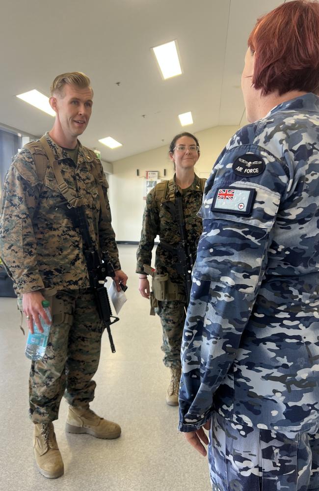 With M4 carbines in-hand, US Marines were greeted by ADF locals in the airport lobby at RAAF Base Darwin.