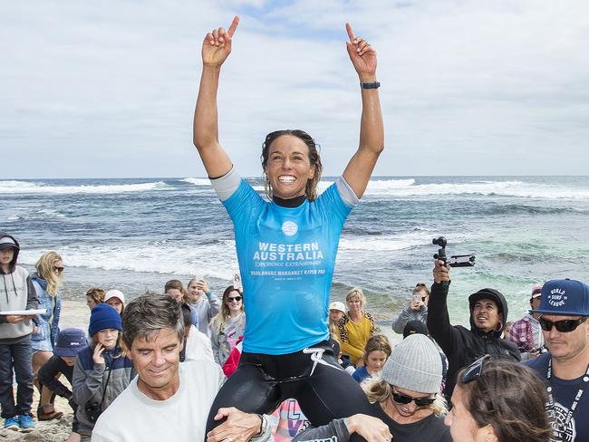 Sally Fitzgibbons is chaired to the podium as the winner of the Drug Aware Margaret River Pro. Pic: WSL.