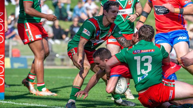 Jackson Walsh busts the line to score. Picture: Thomas Lisson