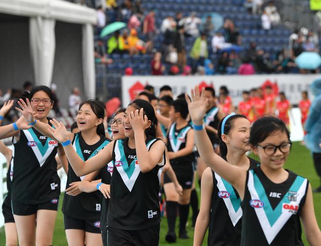 Local AFL players are seen during the Round 9 AFL match between the Gold Coast Suns and the Port Adelaide