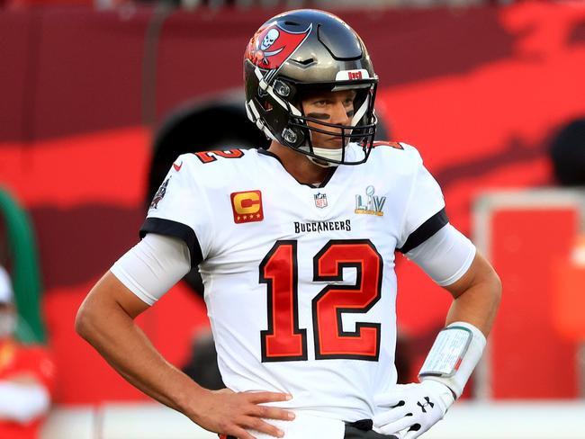 TAMPA, FLORIDA - FEBRUARY 07: Tom Brady #12 of the Tampa Bay Buccaneers warms up before Super Bowl LV against the Kansas City Chiefs at Raymond James Stadium on February 07, 2021 in Tampa, Florida.   Mike Ehrmann/Getty Images/AFP == FOR NEWSPAPERS, INTERNET, TELCOS & TELEVISION USE ONLY ==