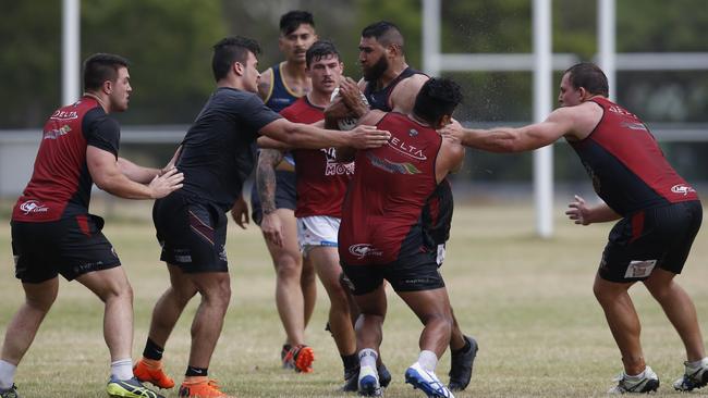 Redcliffe Dolphins players during a pre season training run on Saturday. PHOTO: AAP /Regi Varghese