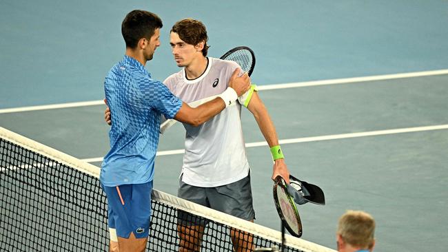 If the cards fall right for Alex de Minaur he could face Novak Djokovic in a tantalising semi-final clash at the Australian Open. Picture: Anthony Wallace / AFP