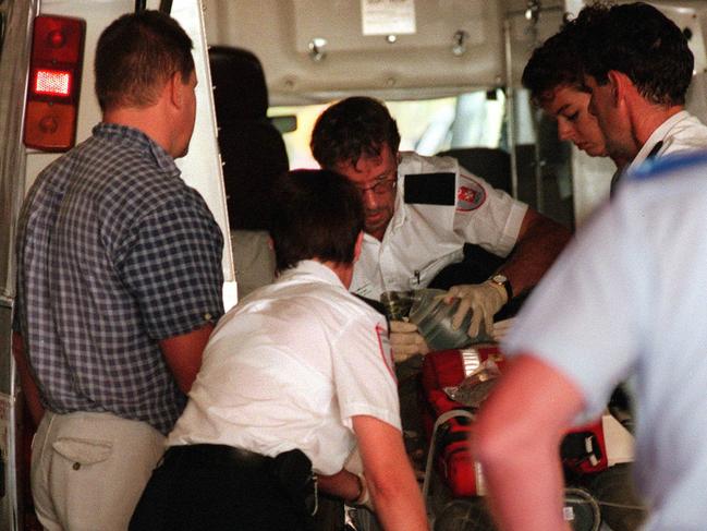 An ambulance arrives at hospital in Darwin with police officer Glen Huitson who later died. Picture: CLIVE HYDE