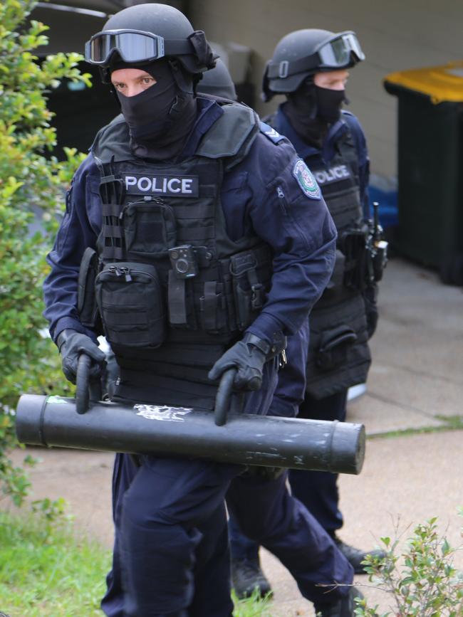 Strike Force Pallamana detectives raid a property in the Hunter Valley.