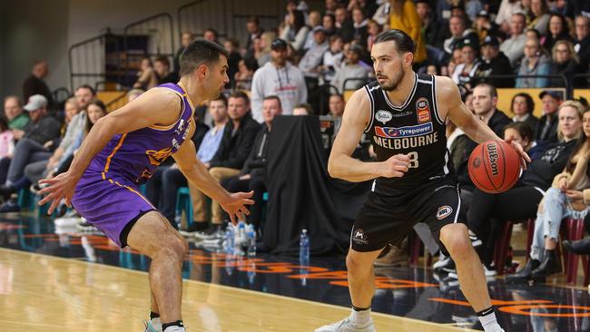 Chris Goulding of Melbourne United (R) in action under pressure from Kevin Lisch of the Sydney Kings during the NBL pre-season match between Melbourne United and the Sydney Kings at State Basketball Centre on September 1, 2018.