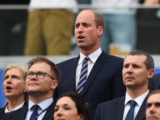 Prince William, Prince of Wales stands for the national anthem and joins in singing. Picture: Justin Setterfield/Getty Images