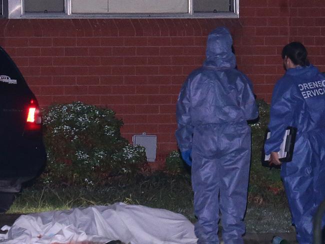 A man has been shot dead on Stafford Street, Kingswood. The body of a male was located on the footpath outside a home and opposite a reserve. Police established a crime scene whilst forensic officers and dog unit searched for evidence. Pics Bill Hearne