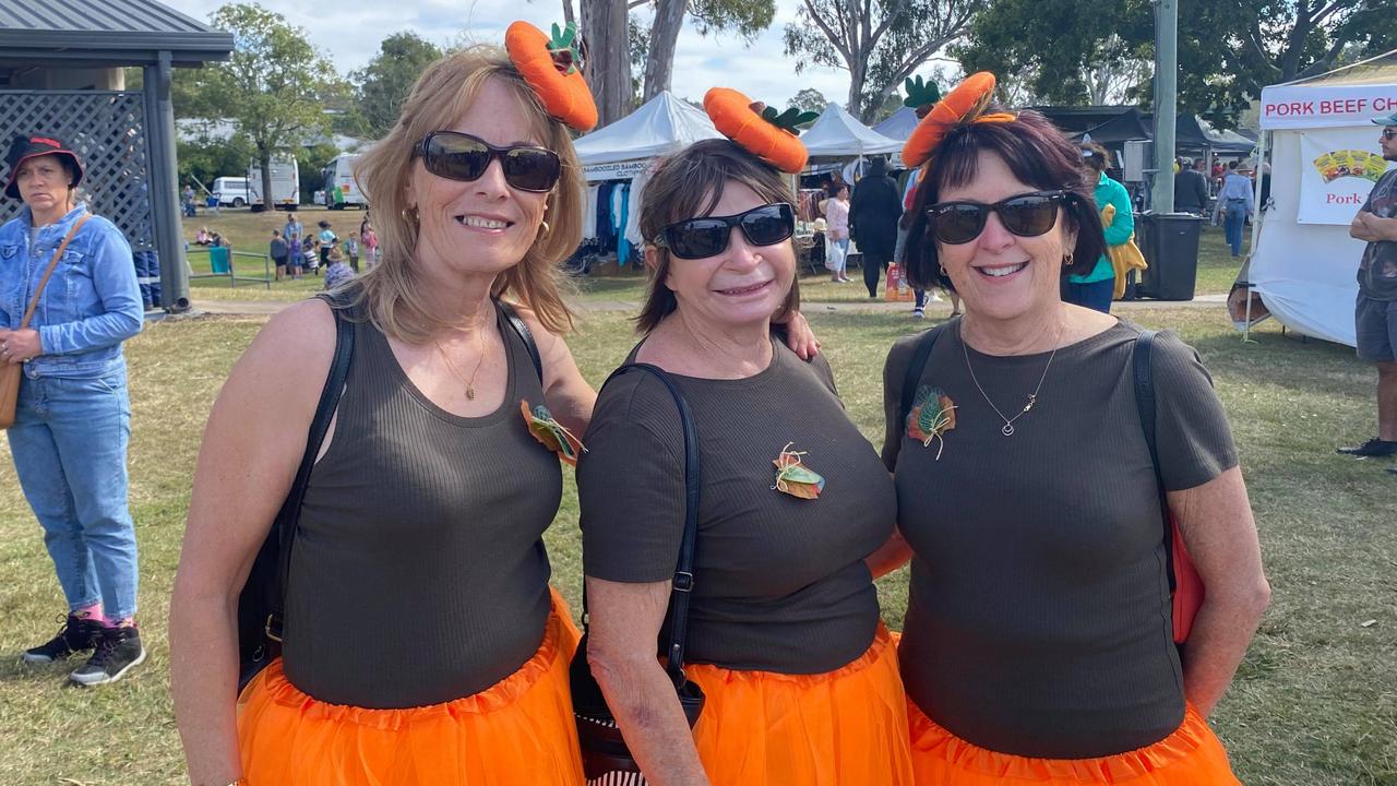 15 crazy outfits from Goomeri Pumpkin Festival 2021: Renate Thommen (left), Bev Ross (centre) and Allison Smith (right).