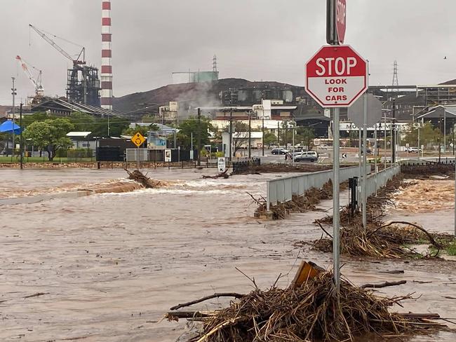 Road and bridges were flooded in Mount Isa after more than 100mm of rain fell at the weekend. Picture: Maurice Busch