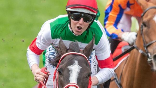 Damian Lane celebrates his second major success in a week as his claims the Cox Plate seven days after winning the Caulfield Cup.