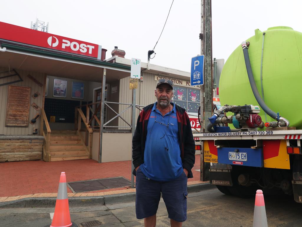 January 2019 Tasmanian Bushfires. Brett Kennedy, owner of the Geeveston Post Office, who also lives out the back of the business with his partner has a water tanker out the front at the ready. Picture: NIKKI DAVIS-JONES