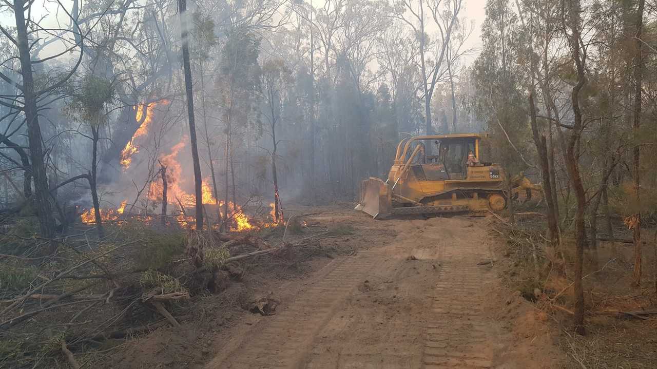 Cambooya Rural Fire Brigade voluntee\r Nathan Greer took these photos while fighting the Forest Ridge and Cypress Gardens fire, yesterday, December 4. Picture: Nathan Greer