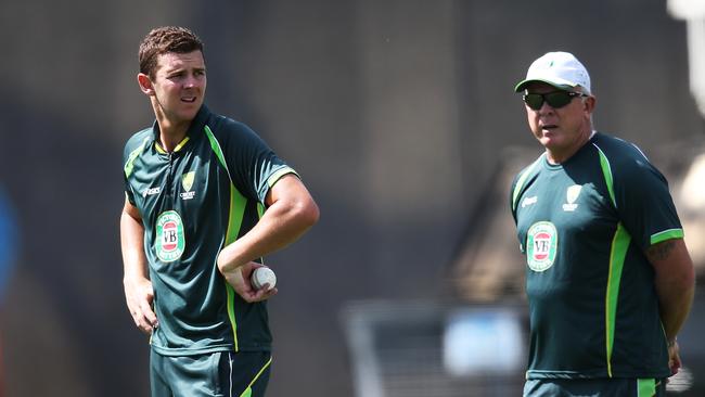 Josh Hazlewood and Craig McDermott during Australian training at Eden Park. Pic Phil Hillyard.