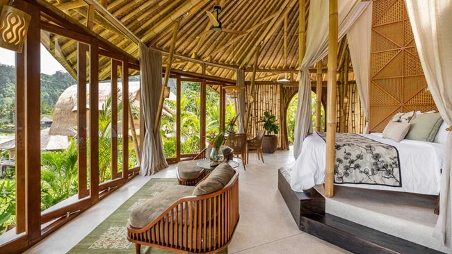 Best Bali hotel for: The ultimate flop and drop escapeSidemen, East BaliFeel your blood pressure drop as you weave through the Sidemen Valley’s emerald green rice fields en route to Samanvaya Adults Only Resort. With mighty volcano Mount Agung as backdrop, the region’s holy temples, waterfalls and working farms make for jaw-dropping ‘authentic Bali’ scenes – the kind you think of when picturing yourself lying by an infinity pool on holiday. Surrounded by a surreal panorama of rice terraces, Samanvaya’s natural beauty is an instant reset button. Known for their architecturally-designed bamboo villas – some with private dipping pools, but all with gorgeous interiors and views – this luxury eco-resort will soon launch eight Riverside Wellness Villas and a Wellness Centre featuring hot and cold plunge pools, a sauna, steam room, gym, and more.Find out more