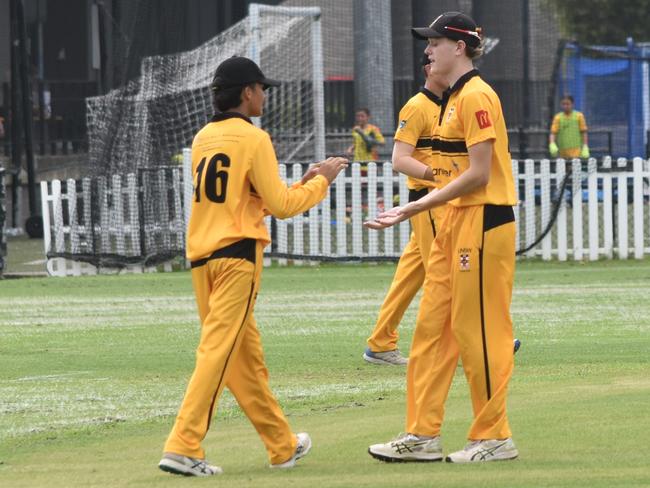 Nirav Sharma (left) is encouraged by captain Samuel Hayes. Picture: Sean Teuma