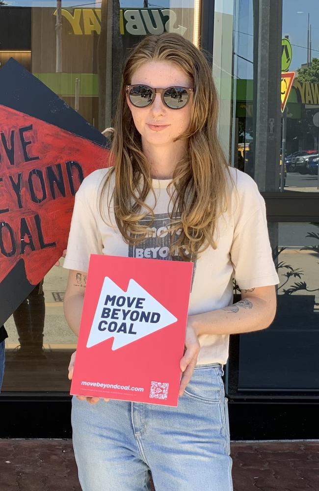 Move Beyond Coal campaigner Imogen Lindenberg outside the NAB branch in Mackay on November 11, 2022. Picture: Duncan Evans