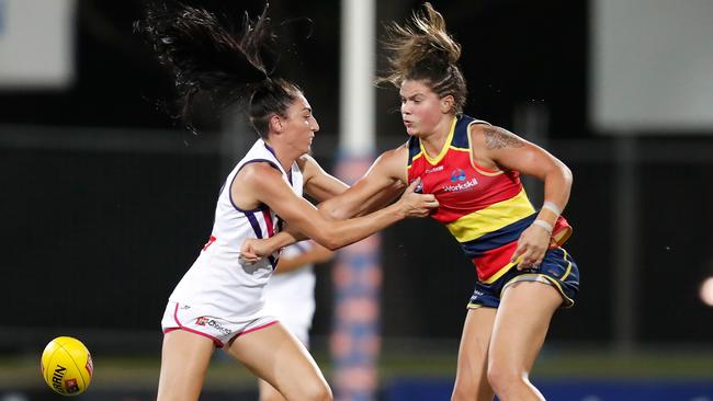 Anne Hatchard of the Crows and Katie-Jayne Grieve of the Dockers during the 2019 NAB AFLW Round 04 match. Picture: Michael Willson/AFL Media