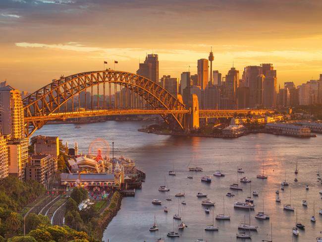 Cityscape image of Sydney, Australia with Harbour Bridge and Sydney skyline during sunset.Escape 16 April 2023NewsPhoto - iStock