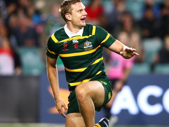 SYDNEY, AUSTRALIA - NOVEMBER 11:  Tom Trbojevic of Australia celebrates scoring a try during the 2017 Rugby League World Cup match between Australia and Lebanon at Allianz Stadium on November 11, 2017 in Sydney, Australia.  (Photo by Mark Kolbe/Getty Images)