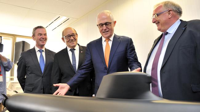 Then prime minister Malcolm Turnbull with French defence officials in Adelaide in 2016, after sealing a new submarine deal. Picture: AAP