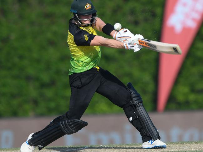 Australia's Steven Smith plays a shot during a warmup cricket match between India and Australia for the ICC menâs Twenty20 World Cup at the ICC Cricket Academy Ground in Dubai on October 20, 2021. (Photo by Aamir QURESHI / AFP)