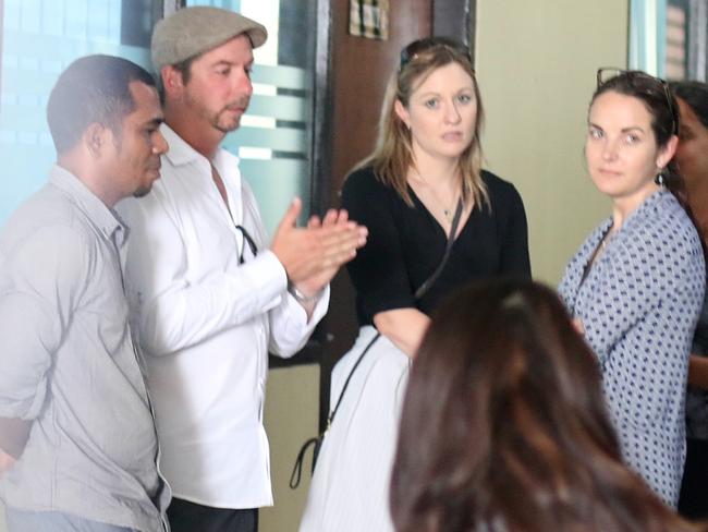 Sara Connor’s ex-husband Anthony Connor (second frm left) and a friend at Denpasar Police station. Picture: Lukman S Bintoro