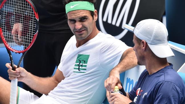 Roger Federer and Lleyton Hewitt at the 2015 Australian Open. Picture: AAP Image/Julian Smith